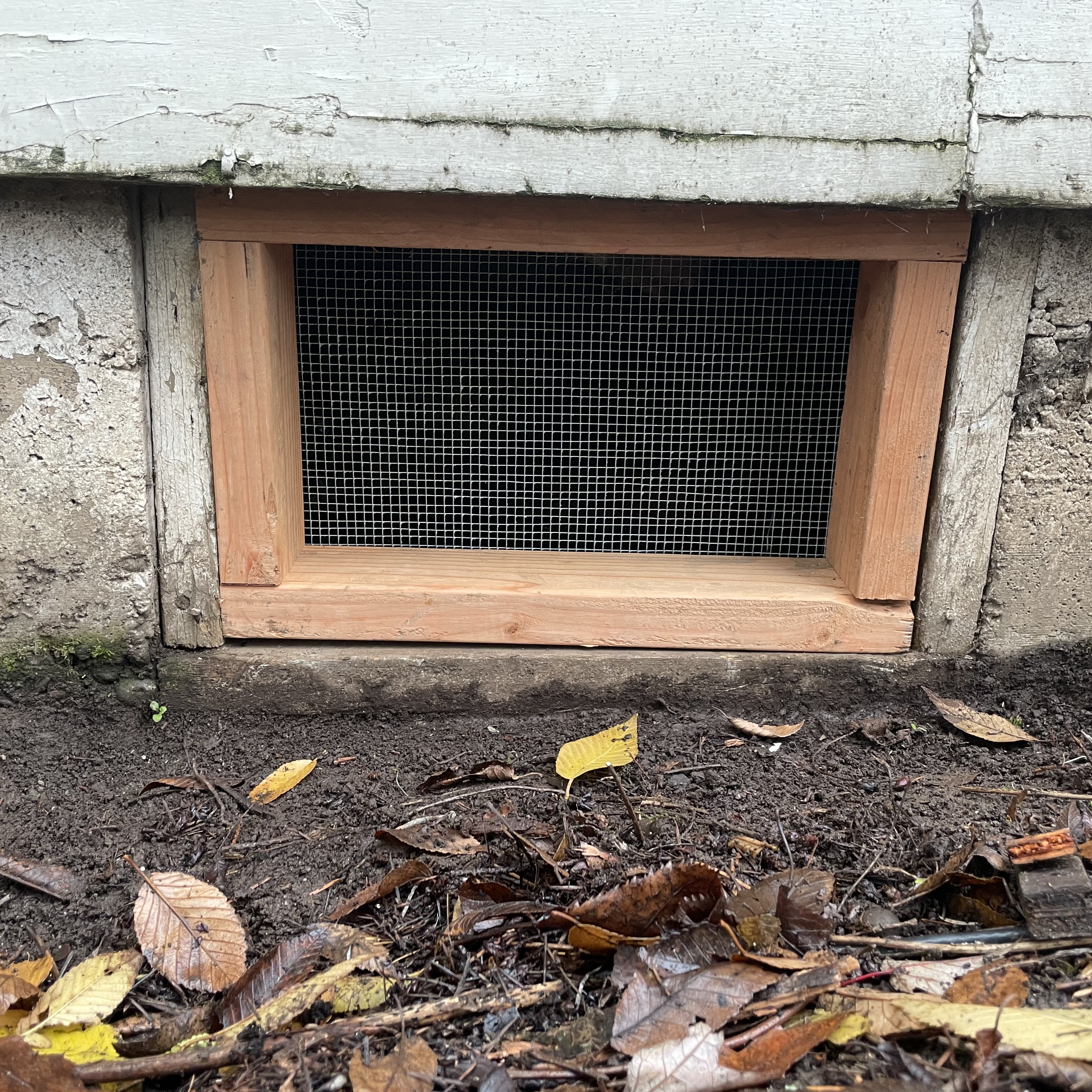 Custom construction to secure a crawl space under a house